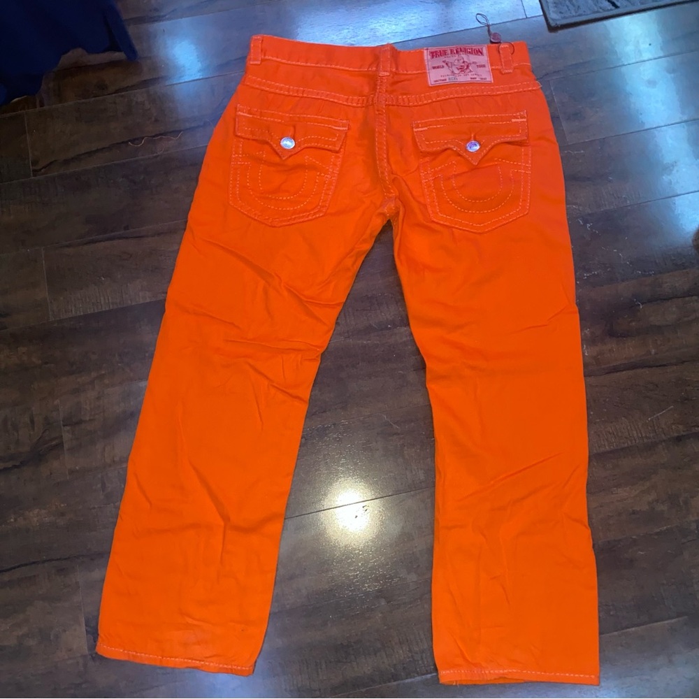 True Religion brand orange jeans